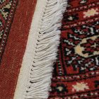 Large oriental rug red Bokhara 244x336 handmade Pakistani rug for living room