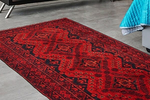 What do we know about the Afghan carpet?